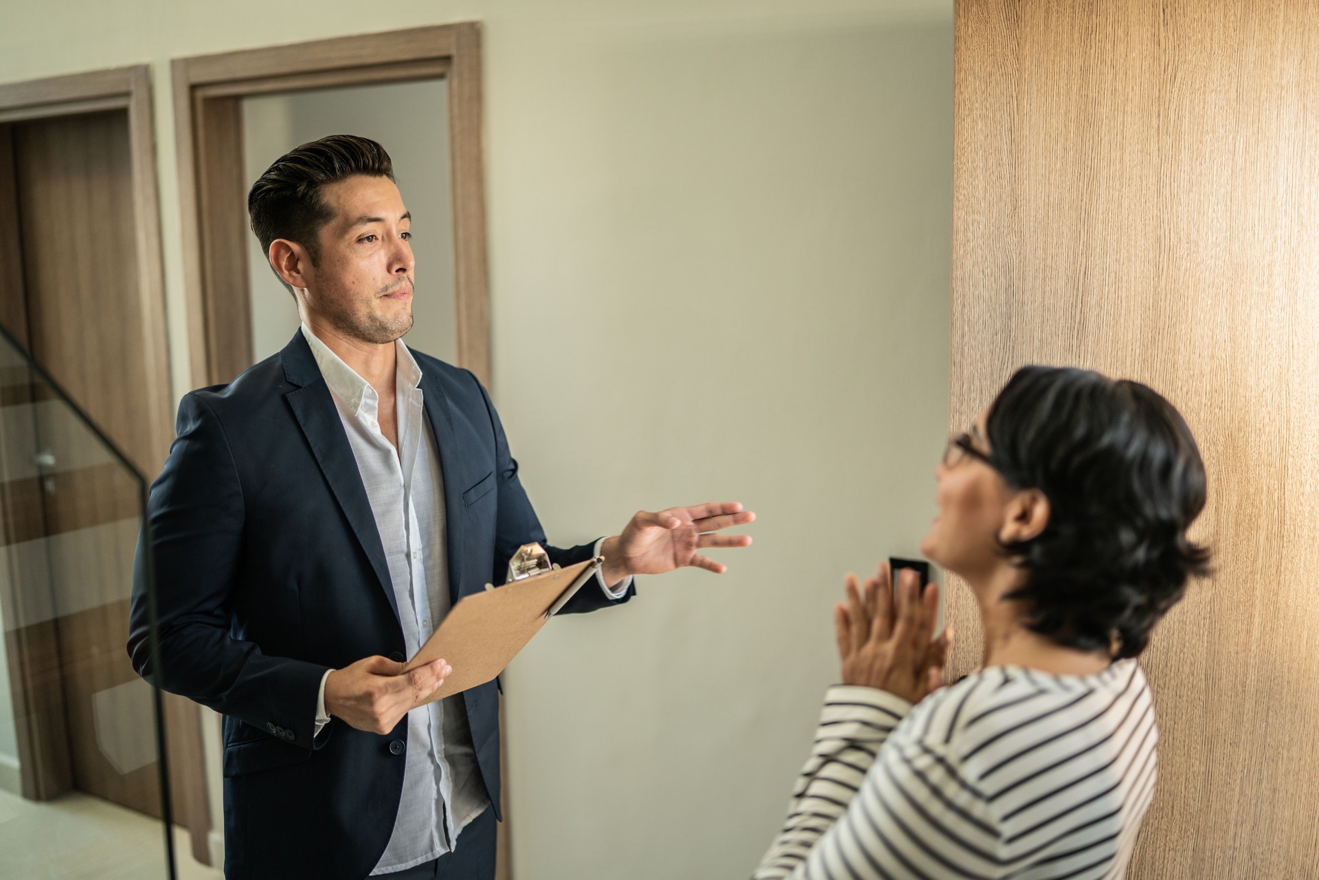 Real estate agent talking with a customer